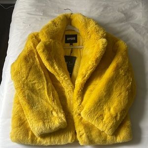 Yellow faux Apparis Coat in size M with tags. Never worn